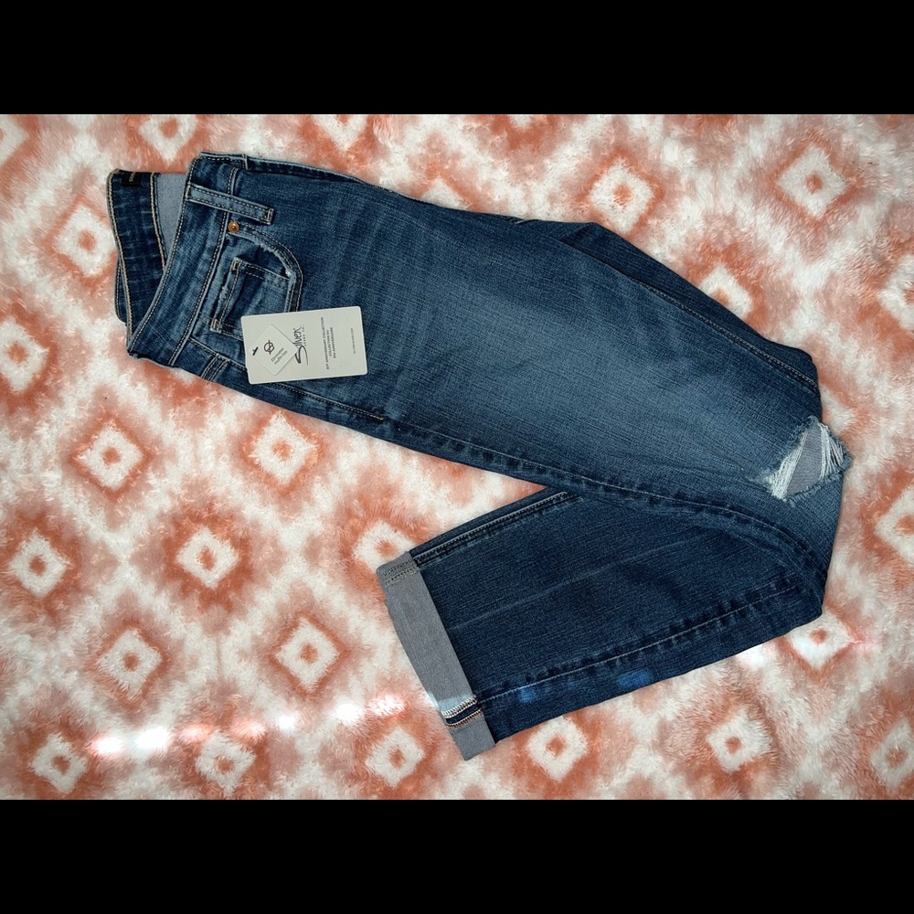 Silver jeans.